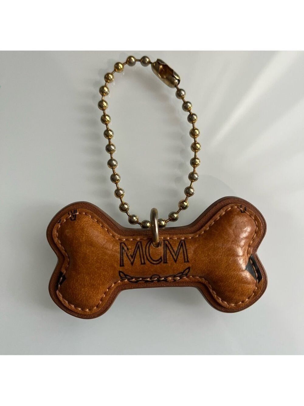 MCM COGNAC DOG BONE BAG CHARM - Picture 2 of 4